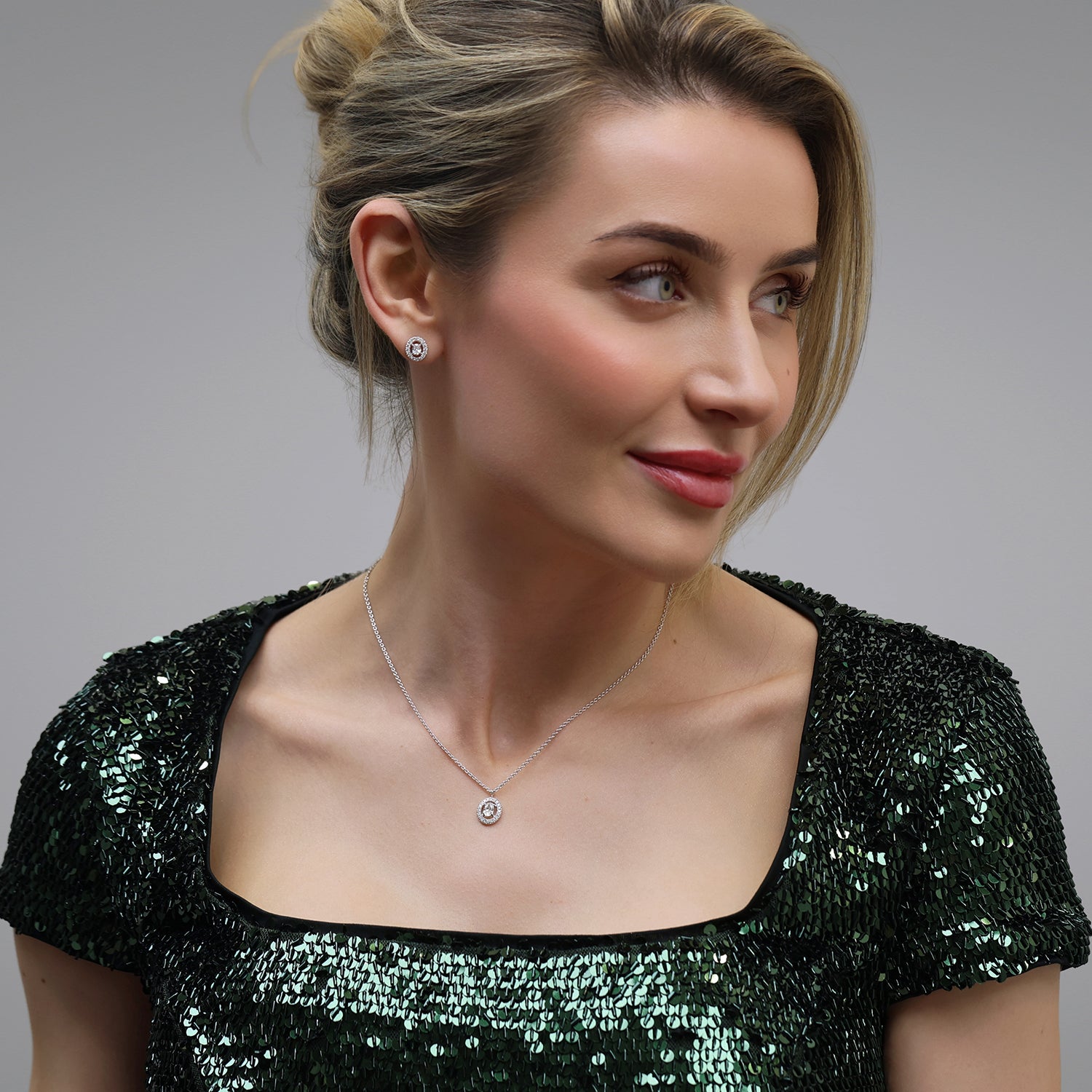 18ct White Gold Oval Diamond Halo Earrings