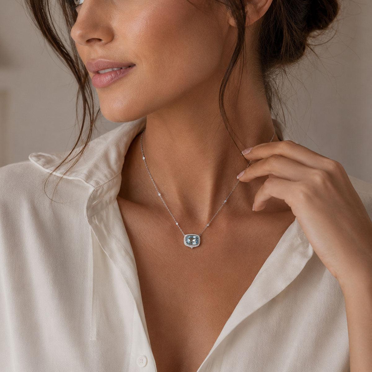 Berry's 18ct White Gold Aquamarine And Diamond Oval Cut Halo Pendant - Berry's Jewellers