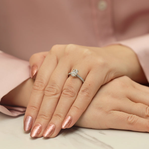 Platinum GIA Certified Oval Cut Diamond Ring With Diamond Set Shoulders