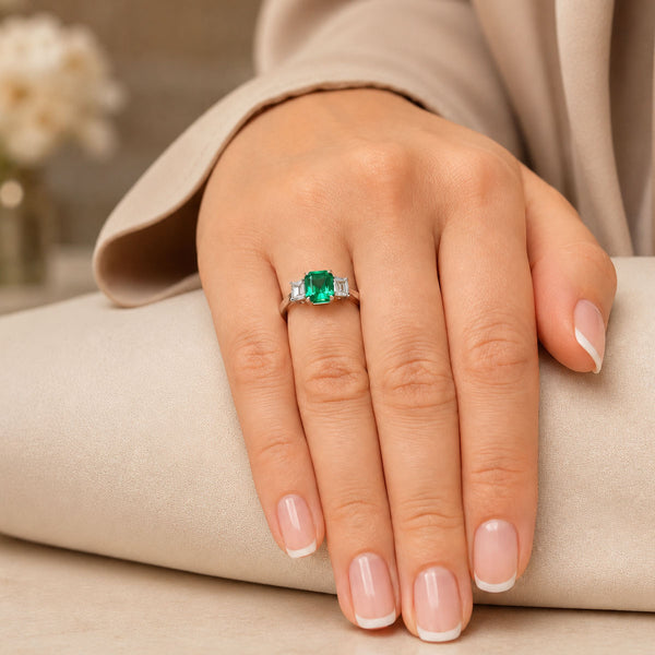 18ct White Gold Emerald And Diamond Three Stone Ring