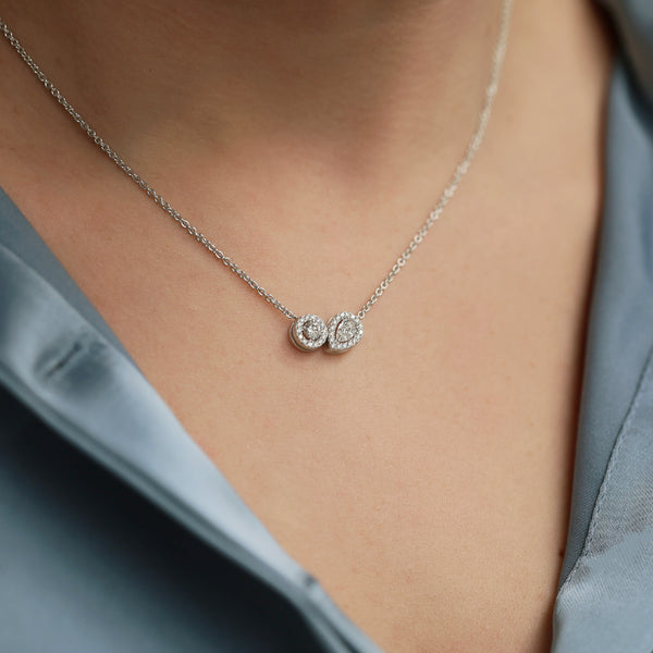 Berry's 18ct White Gold Toi Et Moi Round Brilliant & Pear Cut Diamond Two Stone Halo Pendant - Berry's Jewellers