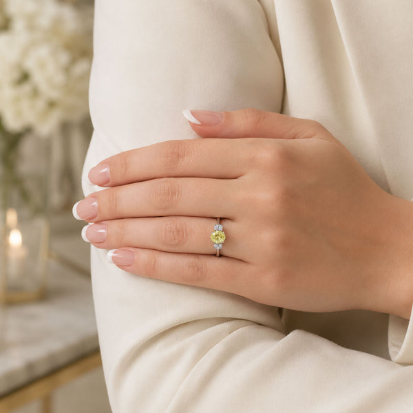 Platinum Fancy Yellow Oval Cut Diamond Three Stone Ring With Oval Cut Diamond Side Stones