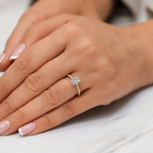 18ct Yellow Gold Emerald Cut Diamond Engagement Ring With Diamond Shoulders