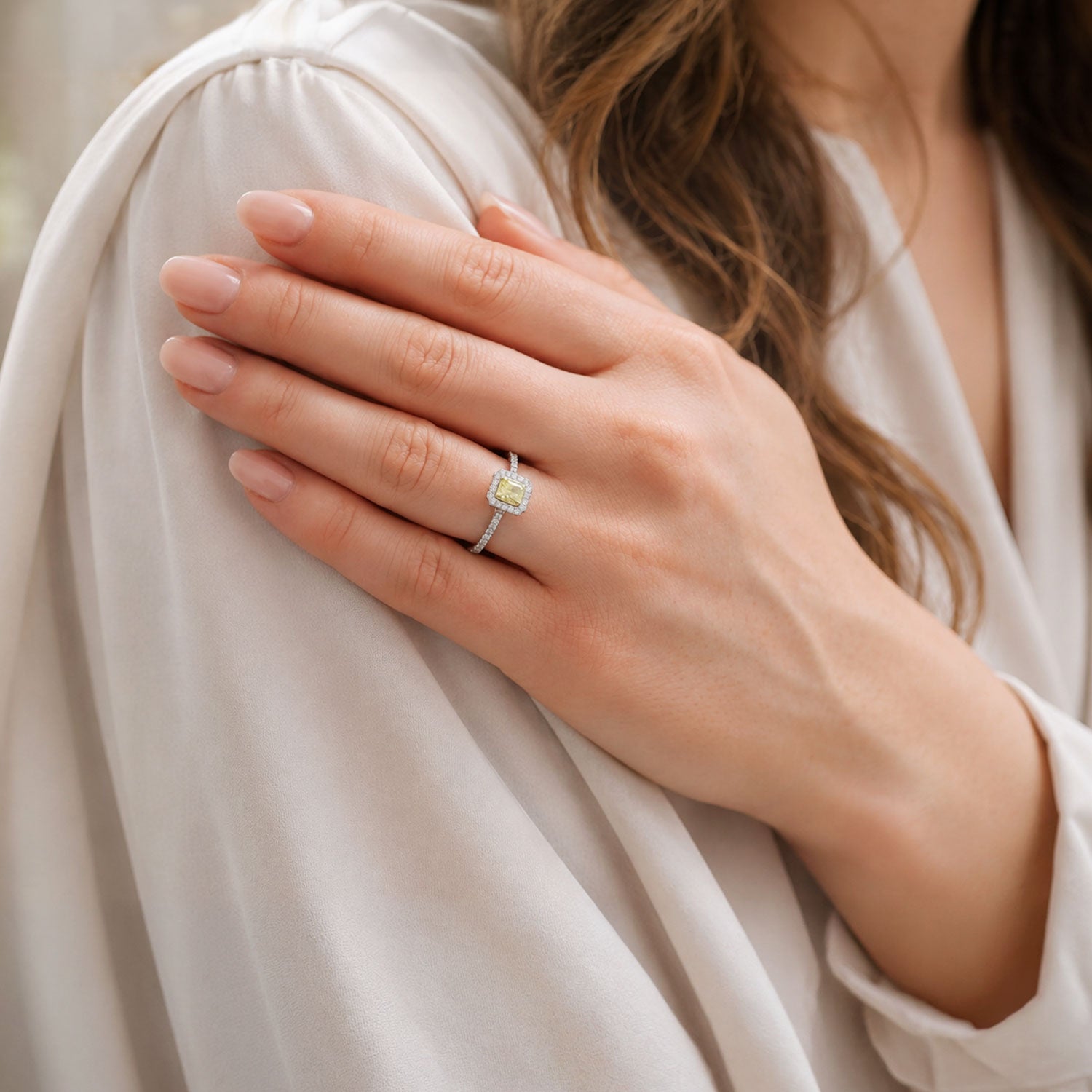 Platinum Radiant Cut Yellow Diamond Halo Ring With Diamond Set Shoulders