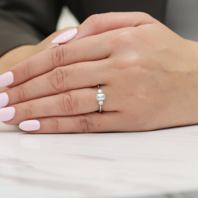 Berry's Platinum Emerald Cut And Round Brilliant Cut Diamond Three Stone Ring - Berry's Jewellers
