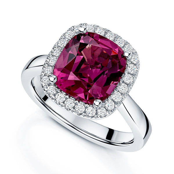 Platinum Cushion Cut Rhodolite Garnet With A Diamond Halo Surround