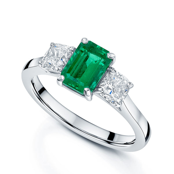 Platinum Emerald And Diamond Three Stone Dress Ring