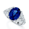 18ct White Gold Oval Cut Blue Sapphire And Diamond Shoulder Dress Ring