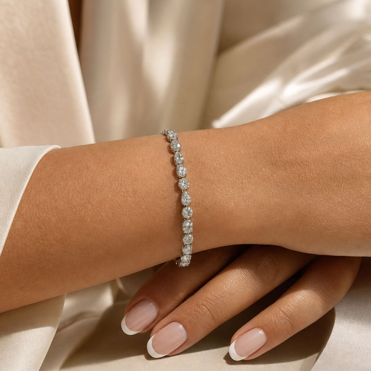 Platinum Oval, Pear And Round Brilliant Cut Tennis Bracelet