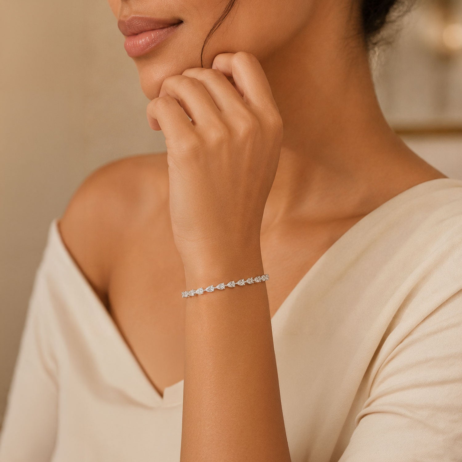 Platinum Pear Cut Diamond Claw Set Tennis Bracelet