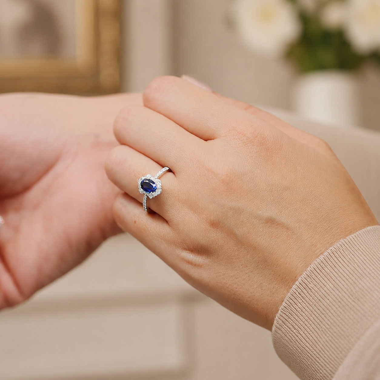 18ct White Gold Oval Sapphire And Diamond Fancy Cluster Ring With Diamond Shoulders