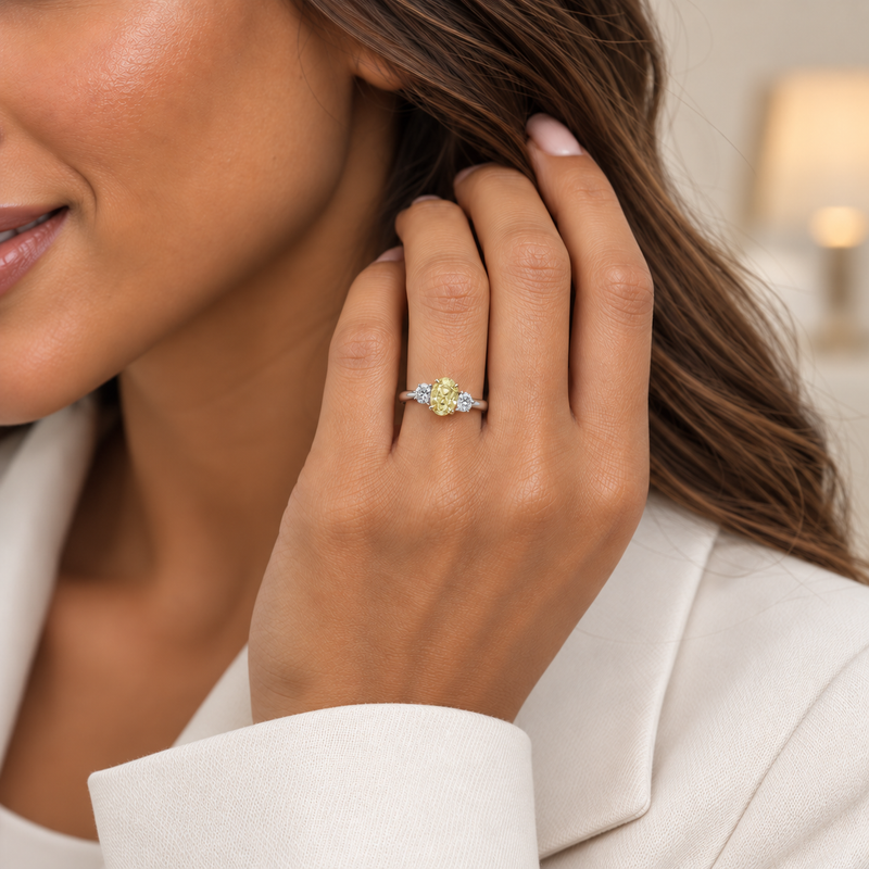 Berry's Platinum Oval Cut Yellow Diamond and White Diamond Three Stone Ring - Berry's Jewellers