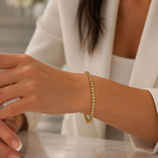 18ct Yellow Gold Round Brilliant Cut Diamond Tennis Bracelet In A Rub Over Setting