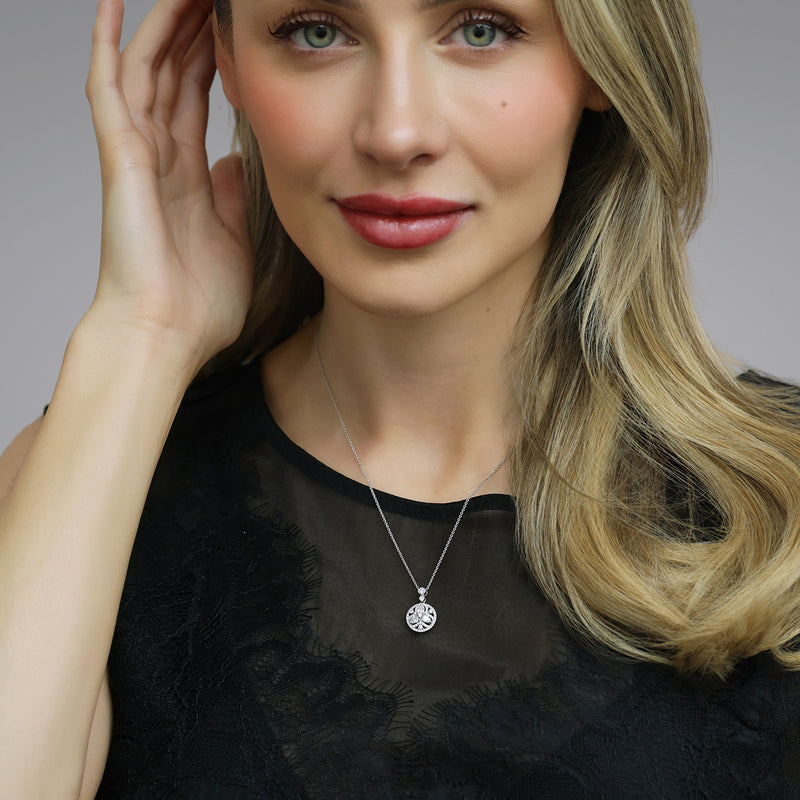 18ct White Gold Round Brilliant and Pear Cut Diamond Cluster Pendant