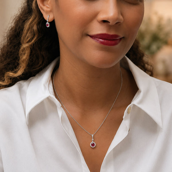 Berry's 18ct White Gold Round Brilliant Cut Ruby And Diamond Halo Pendant With A Diamond Bale - Berry's Jewellers