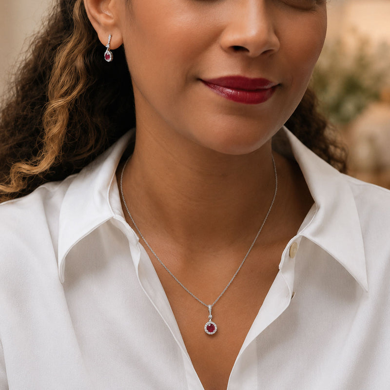 Berry's 18ct White Gold Round Brilliant Cut Ruby And Diamond Halo Pendant With A Diamond Bale - Berry's Jewellers