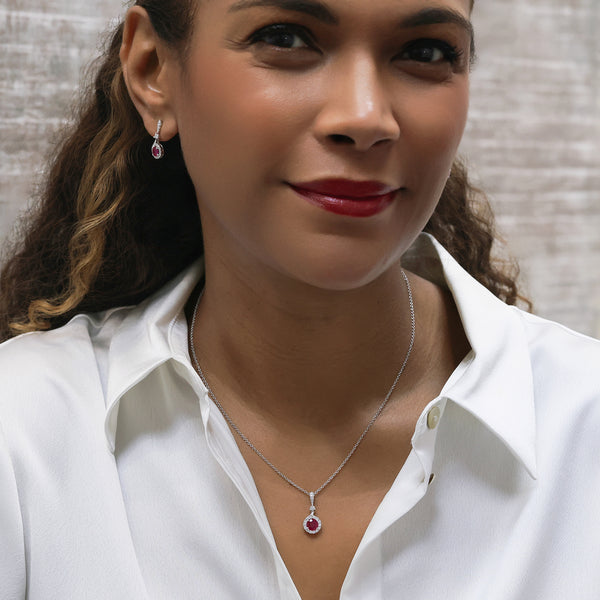 Berry's 18ct White Gold Round Brilliant Cut Ruby And Diamond Halo Pendant With A Diamond Bale - Berry's Jewellers