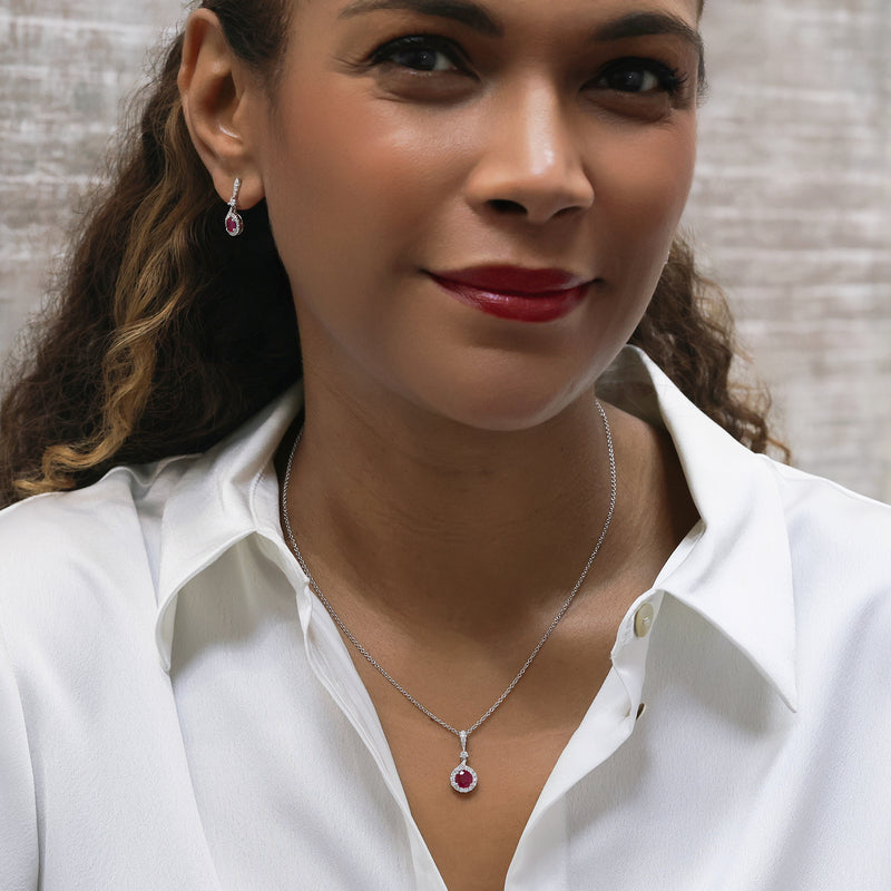 Berry's 18ct White Gold Round Brilliant Cut Ruby And Diamond Halo Pendant With A Diamond Bale - Berry's Jewellers