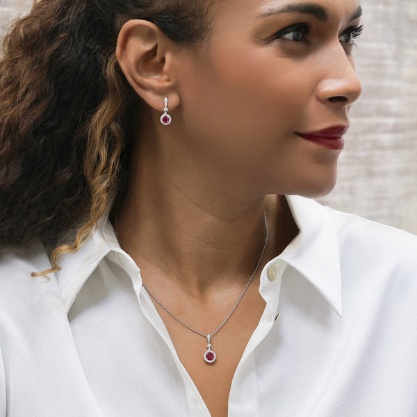 Berry's 18ct White Gold Round Brilliant Cut Ruby And Diamond Halo Pendant With A Diamond Bale - Berry's Jewellers