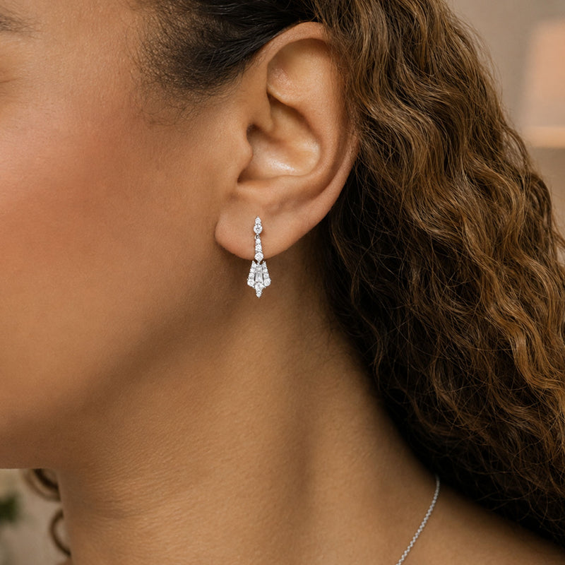 18ct White Gold Reflection Round Brilliant And Baguette Cut Diamond Drop Earrings