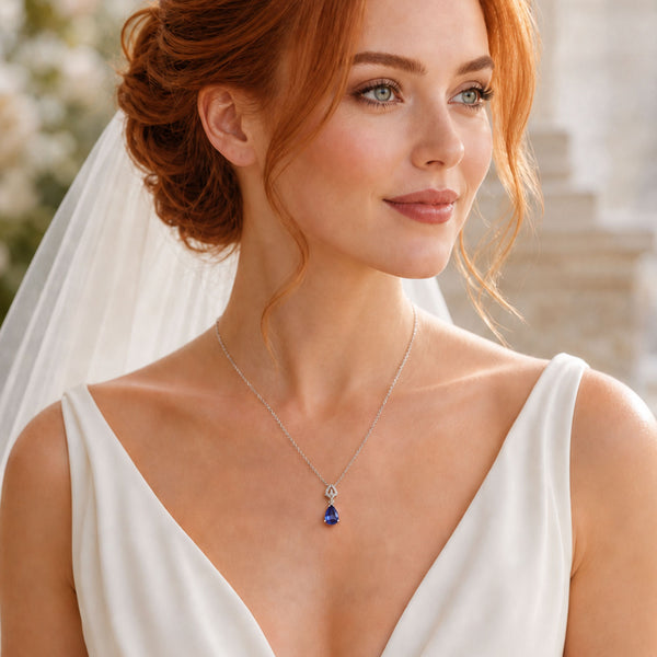 Berry's 18ct White Gold Tanzanite And Diamond Pendant - Berry's Jewellers