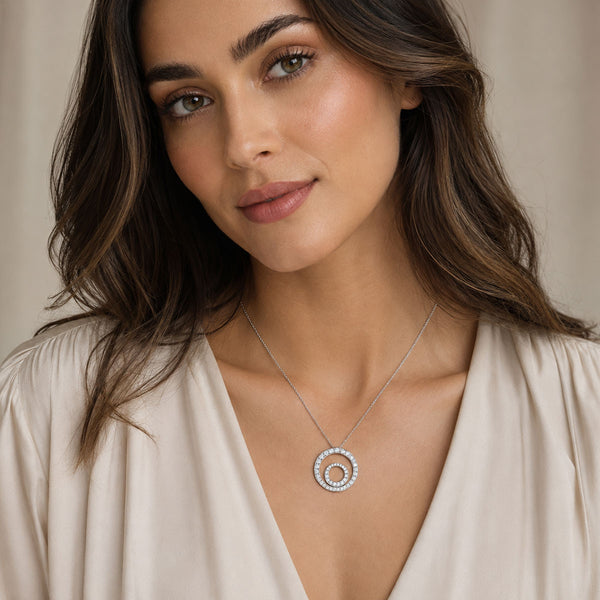 Berry's 18ct White Gold Graduated Brilliant Cut Diamond Double Circular Pendant - Berry's Jewellers