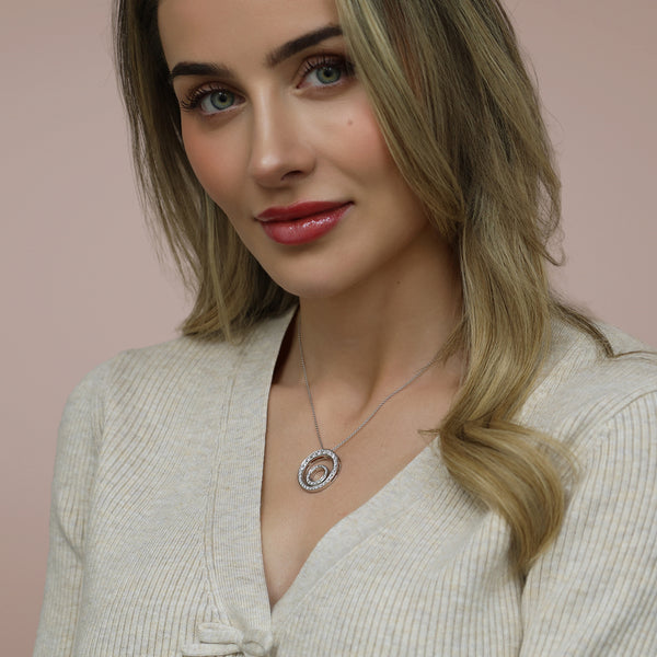 Berry's 18ct White Gold Graduated Brilliant Cut Diamond Double Circular Pendant - Berry's Jewellers