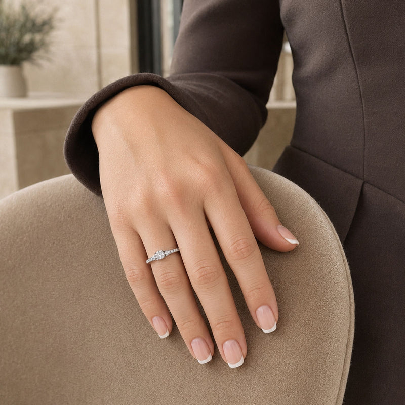 Platinum Round Brilliant Cut 0.30 Carat Diamond Ring With Round Brilliant Cut Diamond Split Shoulders