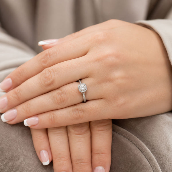 Platinum Round Brilliant Cut Diamond Cluster Ring With Diamond Halo And Channel Set Shoulders