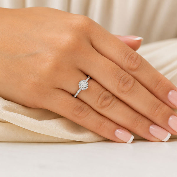 Platinum Round Brilliant Cut Diamond Halo Solitaire Ring With Diamond Shoulders