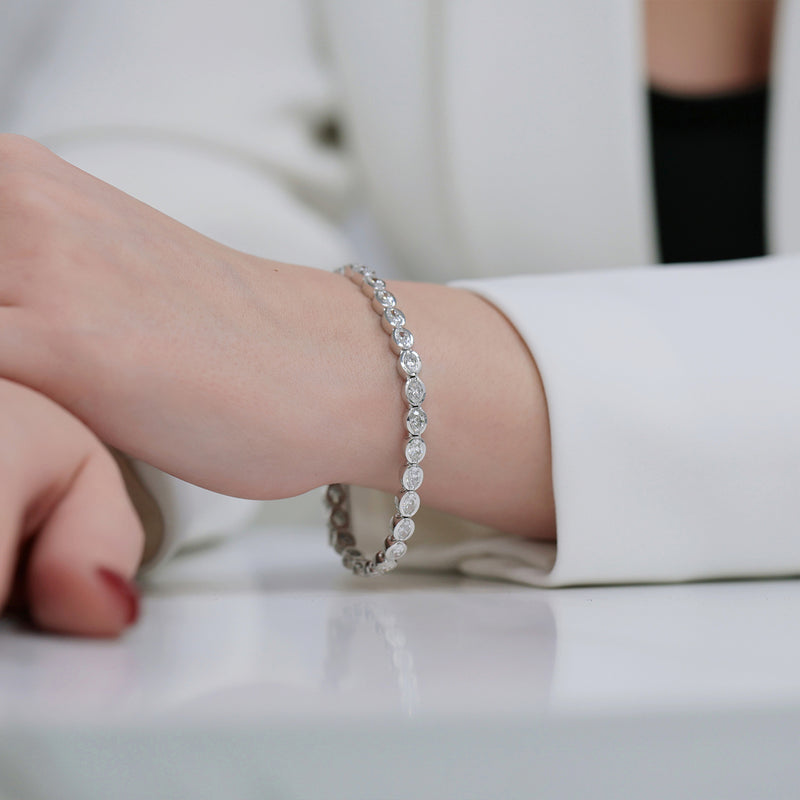 Berry's 18ct White Gold Oval Cut Diamond Rub Over Set Tennis Bracelet - Berry's Jewellers