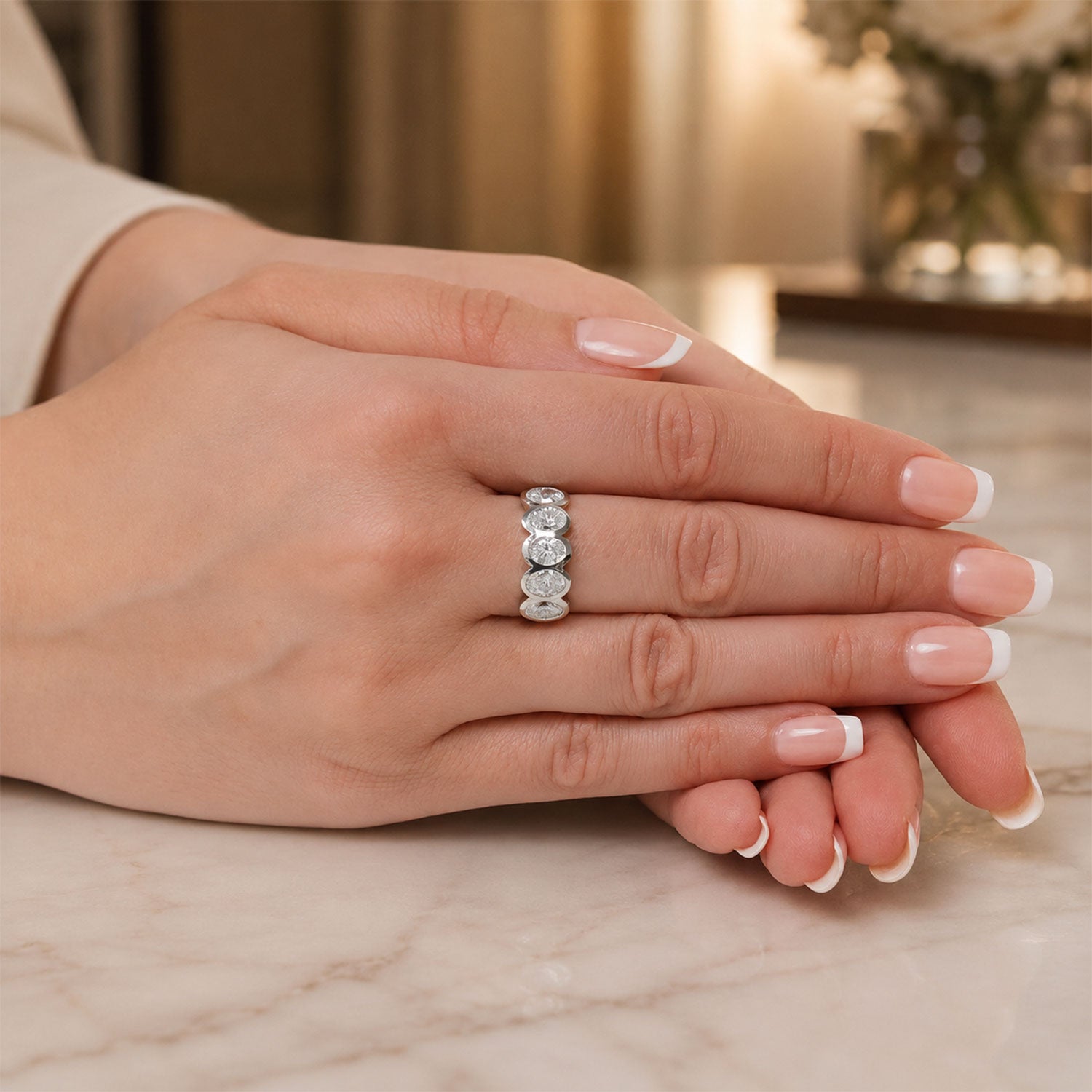 Platinum Oval Cut Diamond Five Stone Rub Over Set Eternity Ring