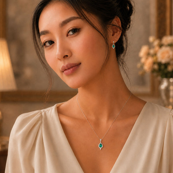 Berry's 18ct White Gold Pear Shaped Emerald And Diamond Vintage Halo Drop Earrings - Berry's Jewellers