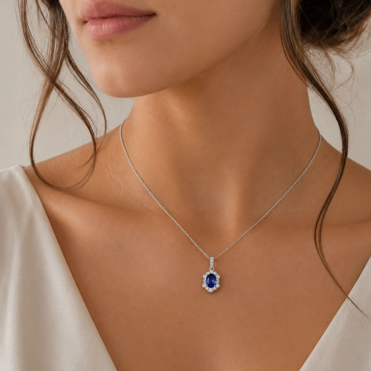 Berry's 18ct White Gold Oval Sapphire And Diamond Fancy Cluster Pendant - Berry's Jewellers