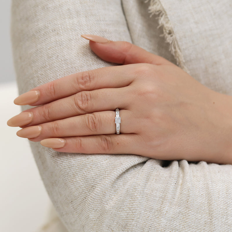 Berry's 18ct White Gold Four Princess Cut Diamond Cluster Ring With Baguette Cut Diamond Channel Set Shoulders - Berry's Jewellers