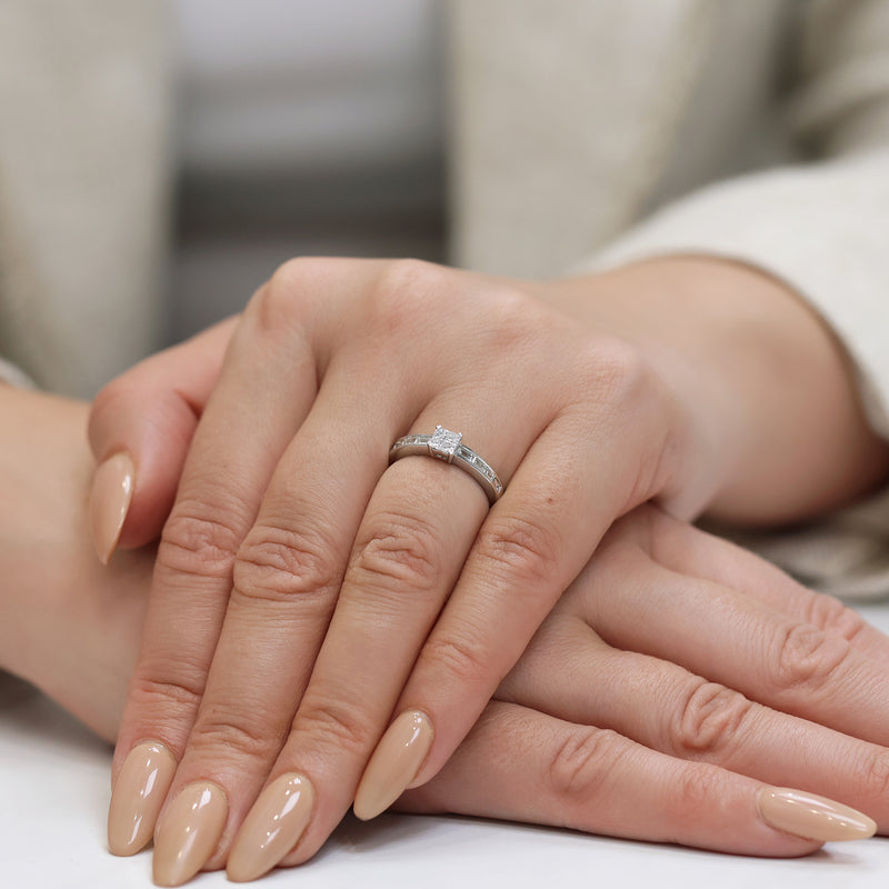 Berry's 18ct White Gold Four Princess Cut Diamond Cluster Ring With Baguette Cut Diamond Channel Set Shoulders - Berry's Jewellers