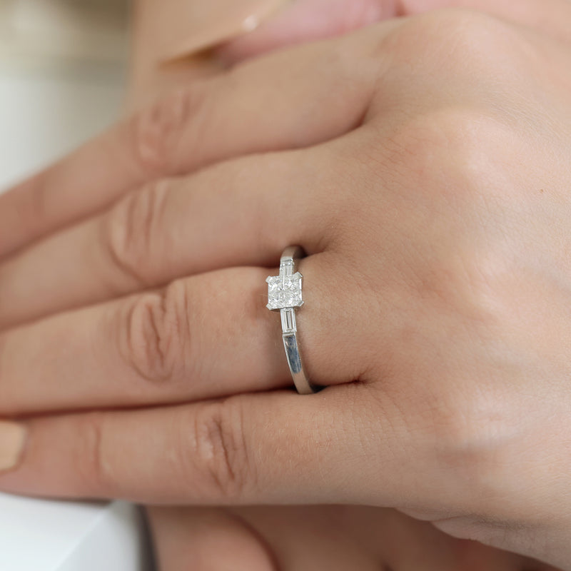 Berry's Platinum Four Princess Cut Diamond Four Claw Set Ring With Baguette Cut Diamond Shoulders - Berry's Jewellers