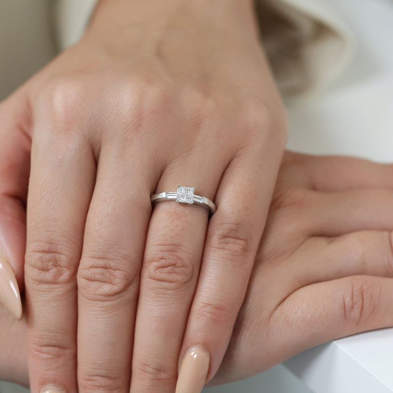 Berry's Platinum Four Princess Cut Diamond Four Claw Set Ring With Baguette Cut Diamond Shoulders - Berry's Jewellers