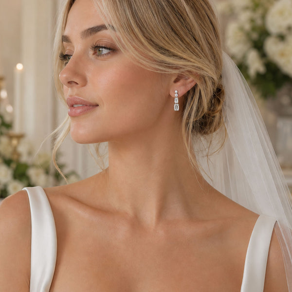 Berry's 18ct White Gold Brilliant and Emerald Cut Diamond Drop Earrings - Berry's Jewellers