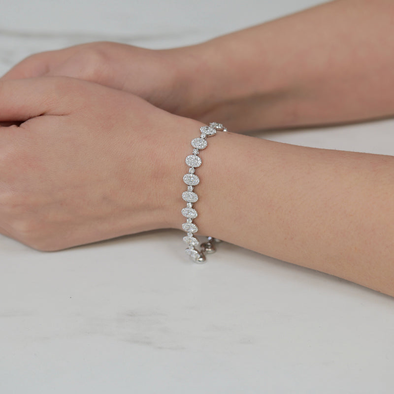 Berry's 18ct White Gold Oval And Round Brilliant Cut Diamond Halo Tennis Bracelet - Berry's Jewellers