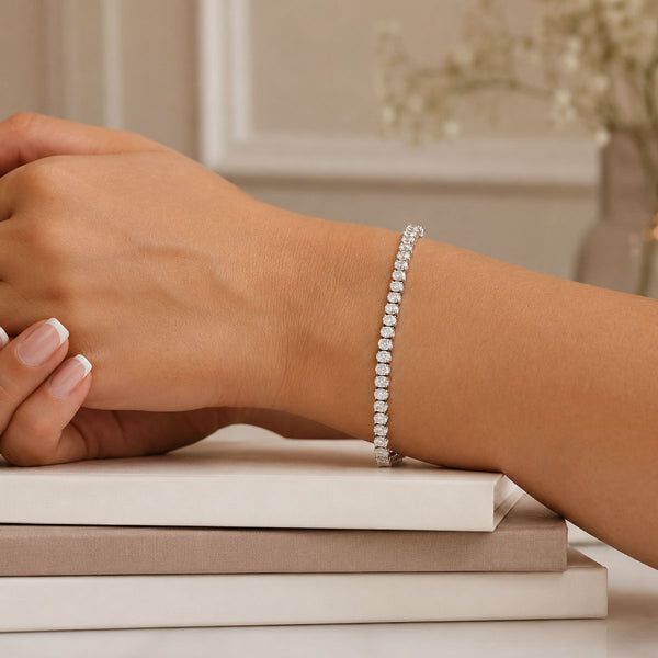 Platinum Claw Set Oval Cut Diamond Tennis Bracelet