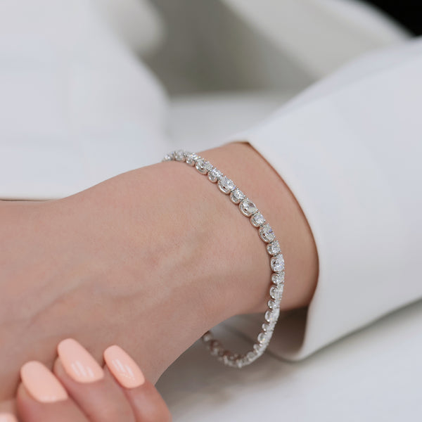 Berry's 18ct White Gold Oval And Round Brilliant Cut Diamond Claw Set Tennis Bracelet - Berry's Jewellers