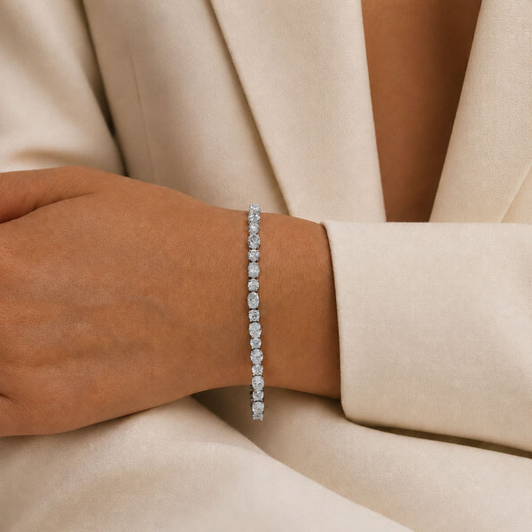 18ct White Gold Oval And Round Brilliant Cut Diamond Claw Set Tennis Bracelet