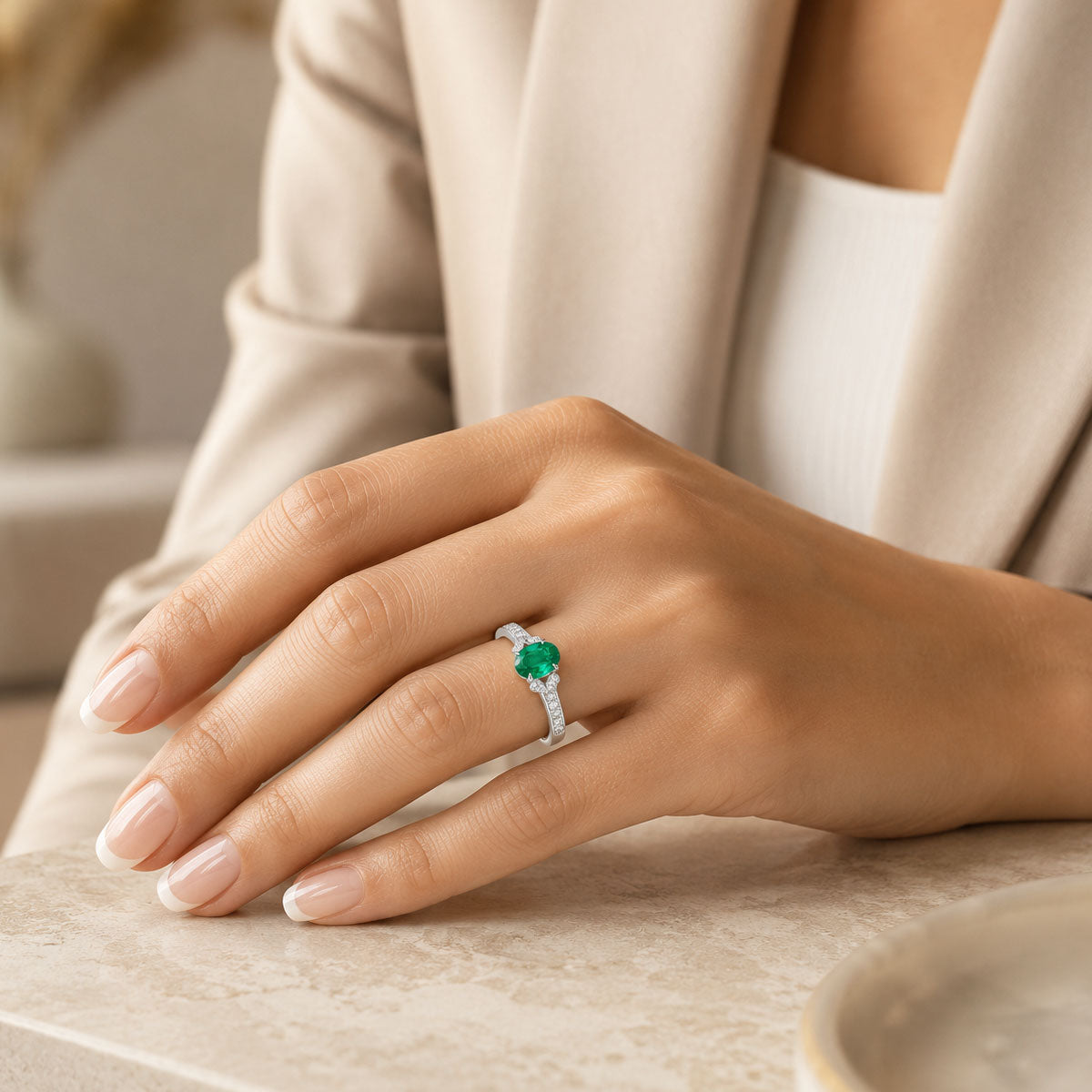 18ct White Gold Oval Emerald Ring With Diamond Set Shoulders