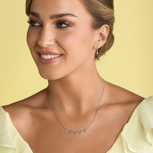 18ct White Gold Rub Over Set Diamond Necklet With Five Diamond Drops