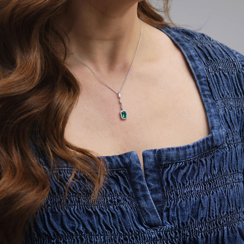 Berry's 18ct White Gold Emerald And Diamond Halo Pendant - Berry's Jewellers