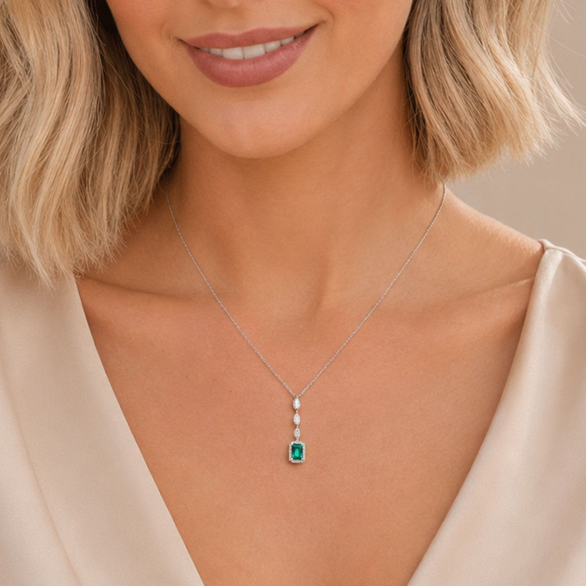 Berry's 18ct White Gold Emerald And Diamond Halo Pendant - Berry's Jewellers