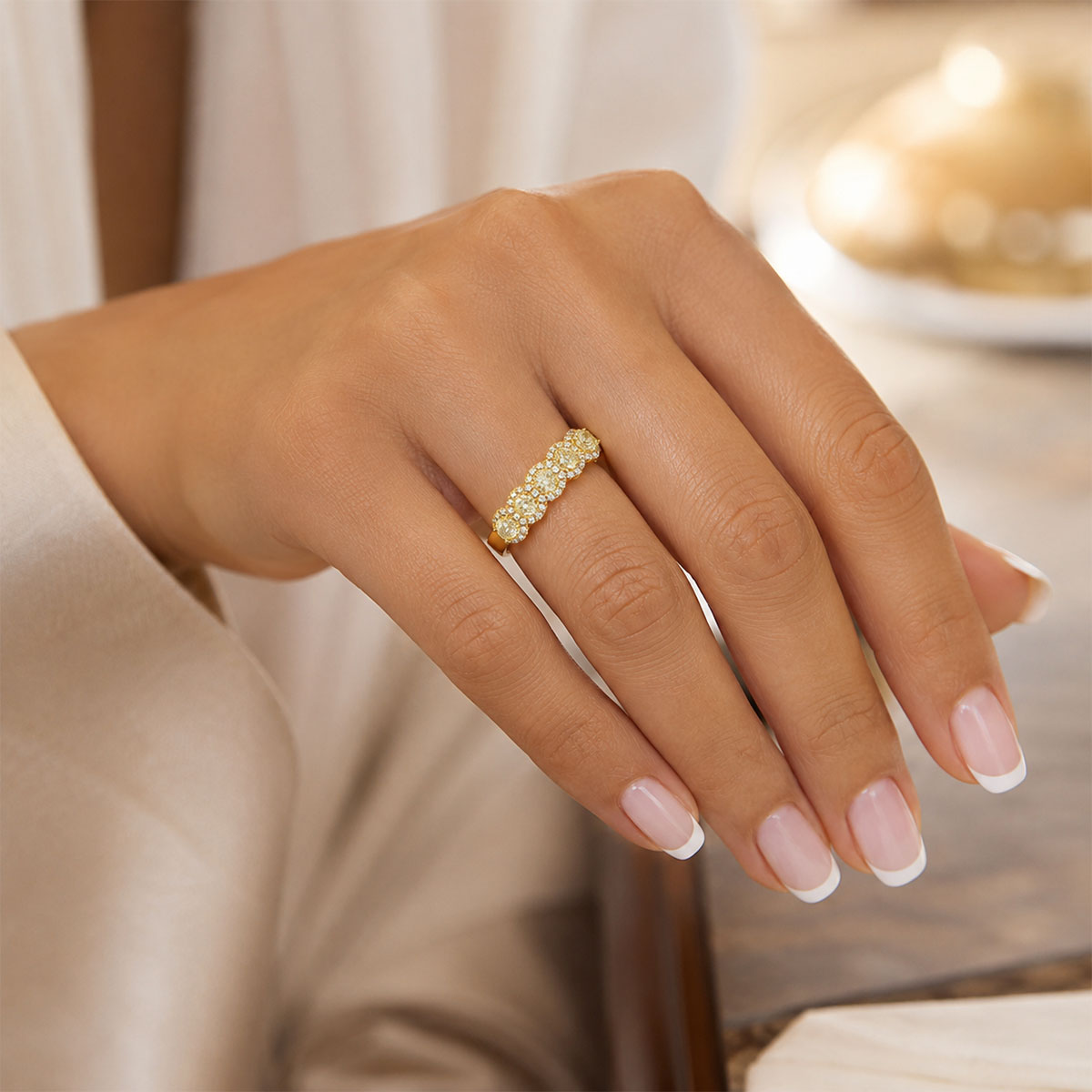 18ct Yellow Gold Oval Cut Yellow Diamond Five Stone Eternity Ring With Diamond Halo Surround