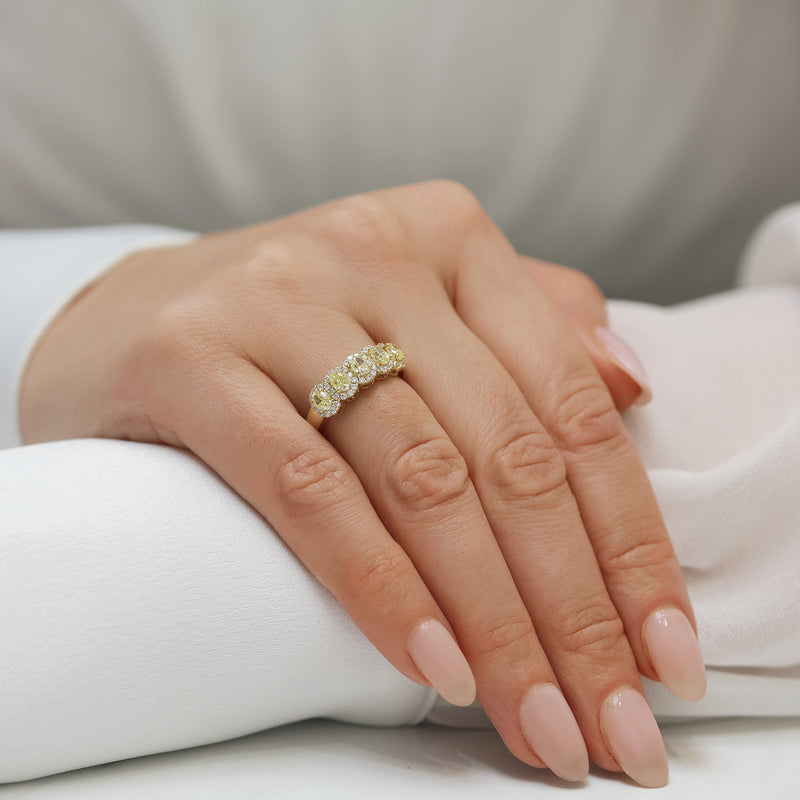 18ct Yellow Gold Oval Cut Yellow Diamond Five Stone Eternity Ring With Diamond Halo Surround