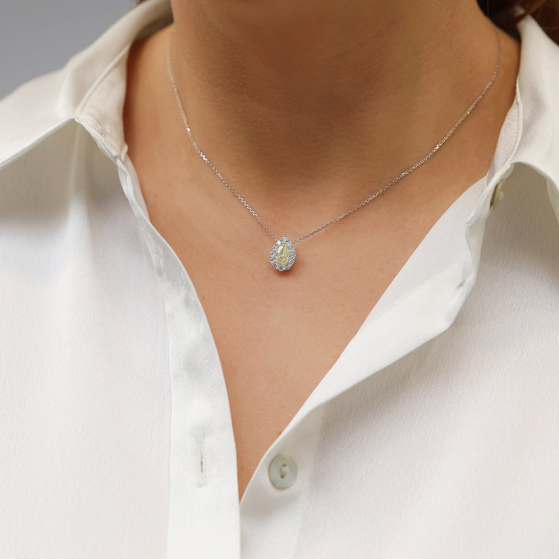 Platinum Pear Cut Yellow Diamond Halo Pendant